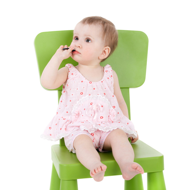 little baby sitting on chair - Фото, изображение
