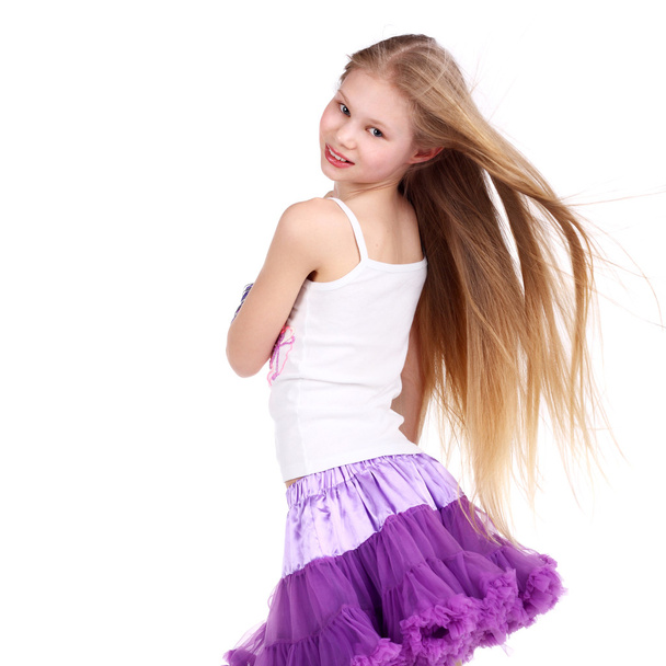 dancing beautiful blonde teenage girl - Фото, зображення