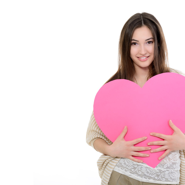 teen girl with pink heart - Valokuva, kuva