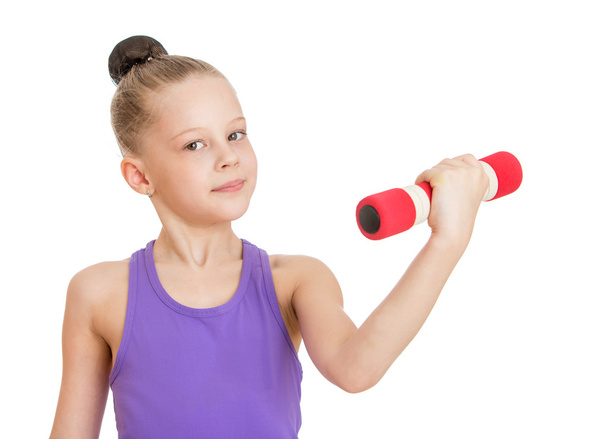 The little girl shakes her biceps - Foto, Bild