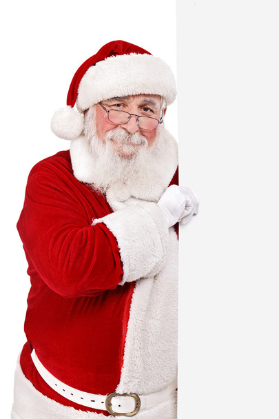 Father Christmas holding blank sing - 写真・画像