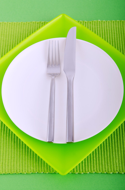 Emtpy plates with utensils on table - Photo, Image