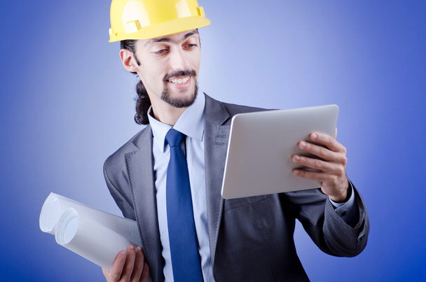 Construction worker working on tablet - Foto, imagen