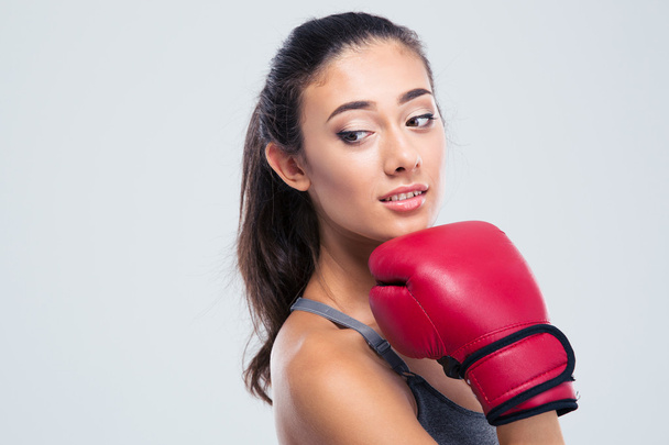 Portrait of a cute fitness woman with boxing gloves  - Fotó, kép