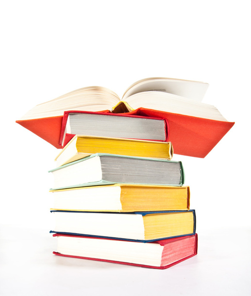 Різнокольорові stacked книг
  - Фото, зображення