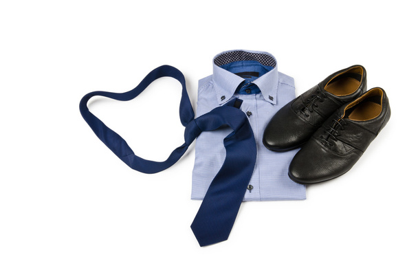 Shoes and shirt with tie on white - Фото, изображение