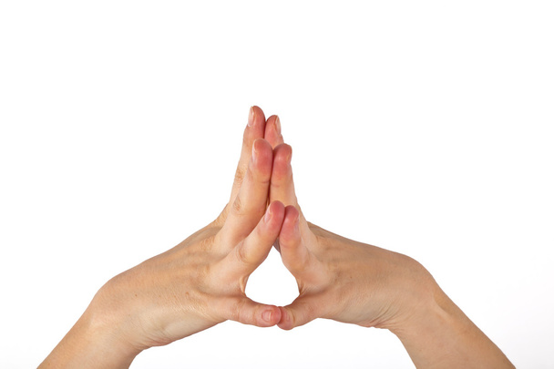 Una mano delle donne è mostrata nel gesto di yoga
 - Foto, immagini