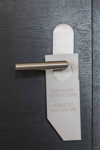 Hotel Door sign do not disturb es/en - Foto, Bild