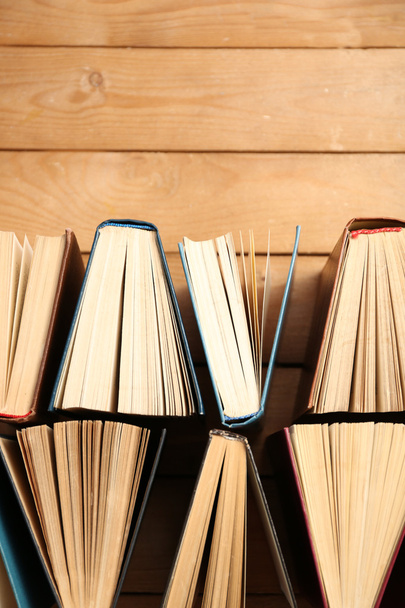 Heart of books, on wooden background - Foto, Imagem