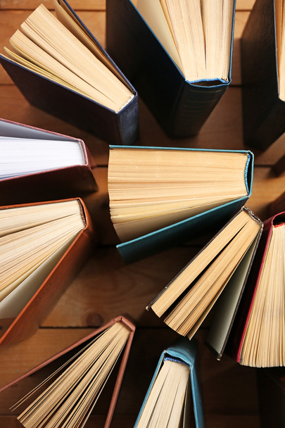 Heart of books, on wooden background - Φωτογραφία, εικόνα