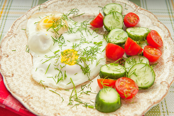 Two fried eggs with vegetables - Photo, Image