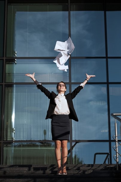Business woman throws up her papers. - Photo, Image