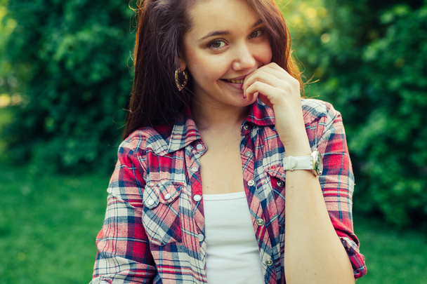 Brown hair girl  in the park - Photo, image