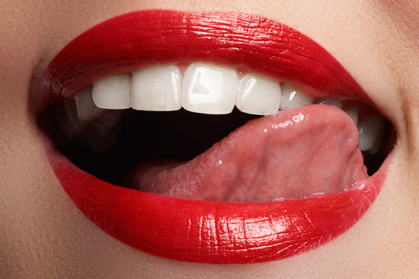Sexy Lips. Beauty Red Lips. Beautiful make-up Closeup. Sensual Mouth. Lipstick and Lipgloss - Fotó, kép