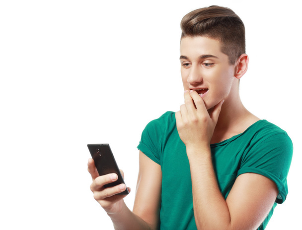 young man with mobile phone - Foto, Bild
