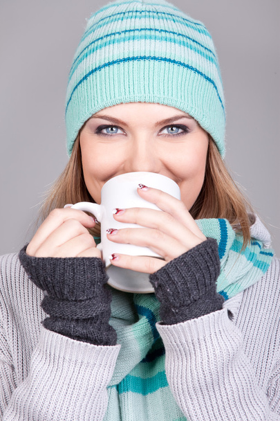 Beautiful girl with hot drink - 写真・画像