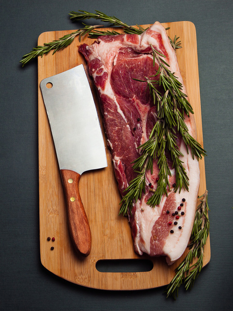 Pork meat on cutting board - Фото, зображення