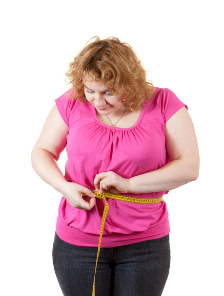 Fat woman measuring waist - Fotó, kép
