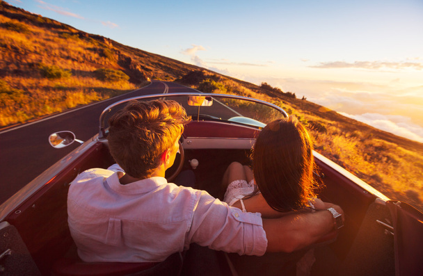 Romantic Couple Driving on Beautiful Road at Sunset - Φωτογραφία, εικόνα