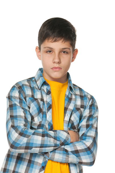 Confident teenager in checked shirt - Zdjęcie, obraz