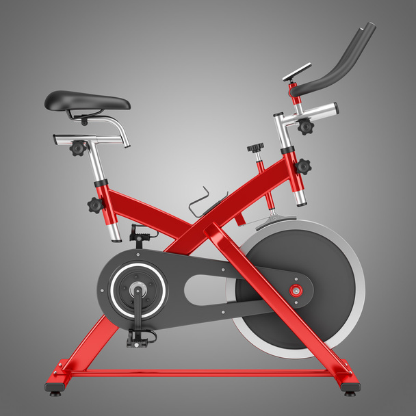 стаціонарний тренувальний велосипед ізольований на сірому фоні
 - Фото, зображення