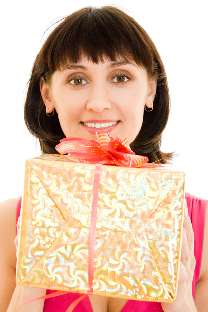 Happy woman with gift on a white background. - Foto, afbeelding