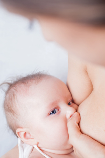 Mother breast feeding a cute baby  - Foto, imagen