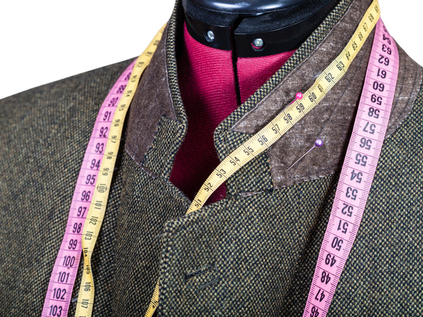 alfaiataria de colarinho de casaco de tweed em manequim
 - Foto, Imagem