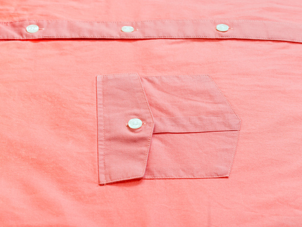 tasca con bottoni di camicia rossa
 - Foto, immagini