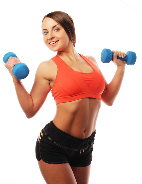 Woman in sport equipment practice with hand weights - Photo, Image