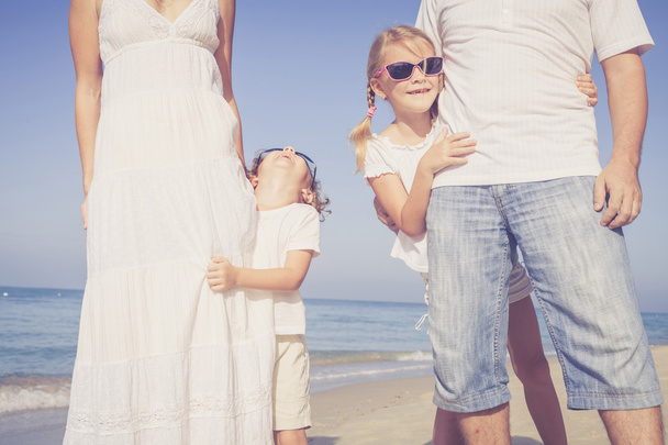 Happy family walking on the beach at the day time. - Photo, Image