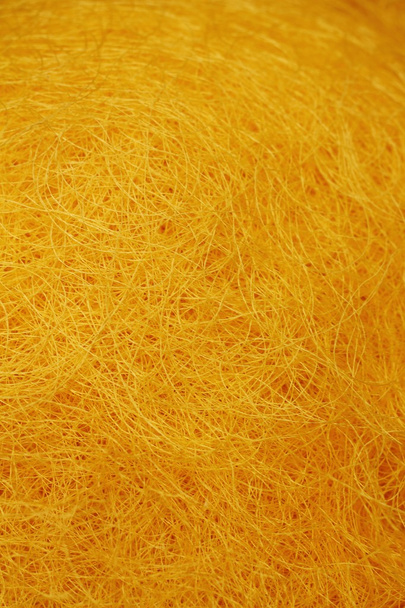 egy csomó sárga selyem egy kosárban. - Fotó, kép