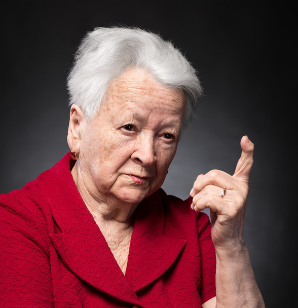 Портрет старої жінки в розлюченому жесті
  - Фото, зображення