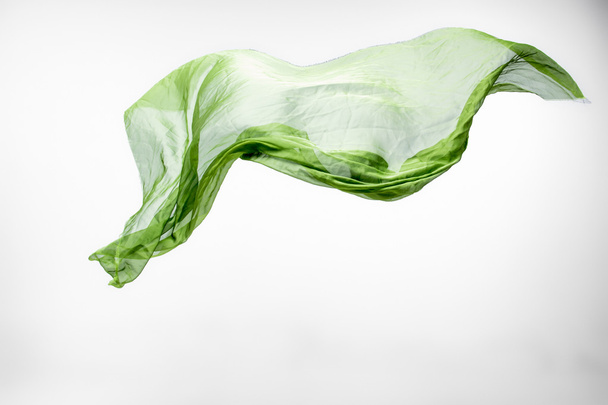 abstract piece of green fabric flying - Zdjęcie, obraz