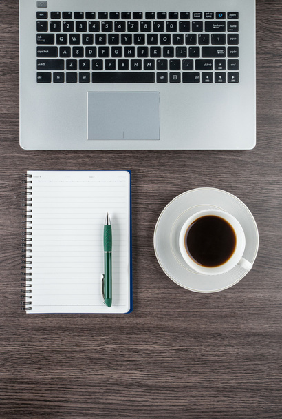 Laptop, notebook and coffee cup on work desk - Fotografie, Obrázek