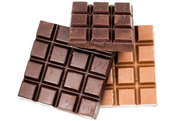 Barras de chocolate preto e leitoso isoladas em branco, vista superior
 - Foto, Imagem