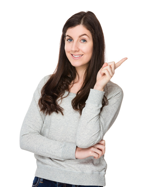 Молода біла жінка в сірому светрі
 - Фото, зображення