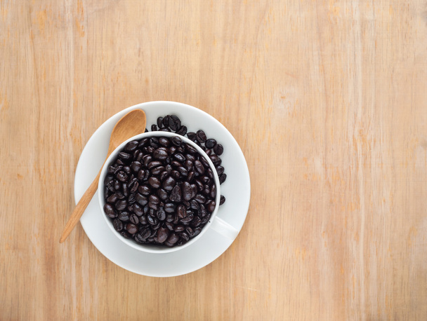 Fresh black coffee in a white cup of coffee - Фото, зображення