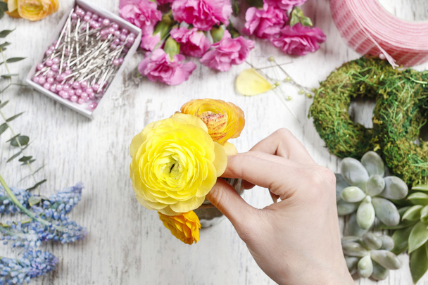 Florist at work. Woman making bouquet  - Photo, Image