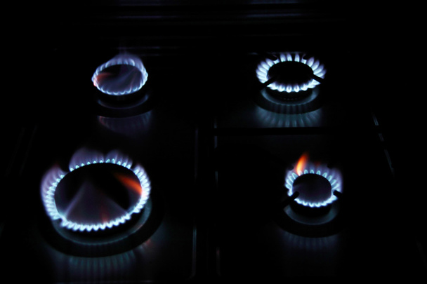 négy lángot a gáz stovel g - Fotó, kép