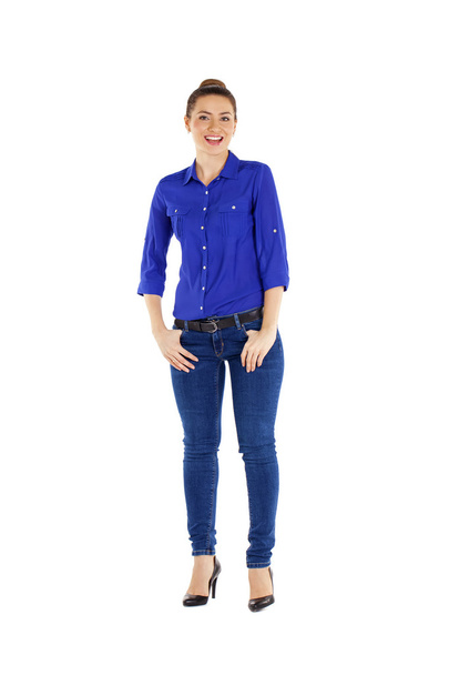 Portrait of a beautiful woman in blue jeans and blue shirt - Fotografie, Obrázek