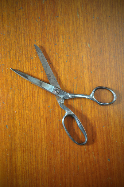 Old scissor on wood background - Photo, Image