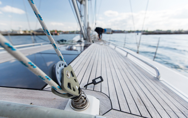 close up of sailboat deck or yacht sailing on sea - Foto, Imagen