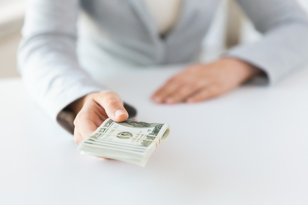 close up of woman hands holding us dollar money - Foto, Imagen