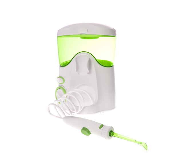 Tanden poetsen, Massage tandvlees. Irrigator voor het reinigen van de mondholte - Foto, afbeelding