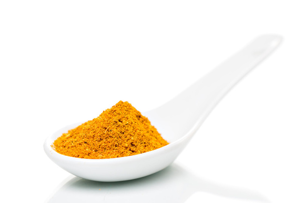 Curry powder on a spoon - Photo, Image