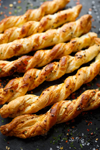 Sticks with puff pastry with cheese and chia seeds. Delicious finger food - Photo, Image