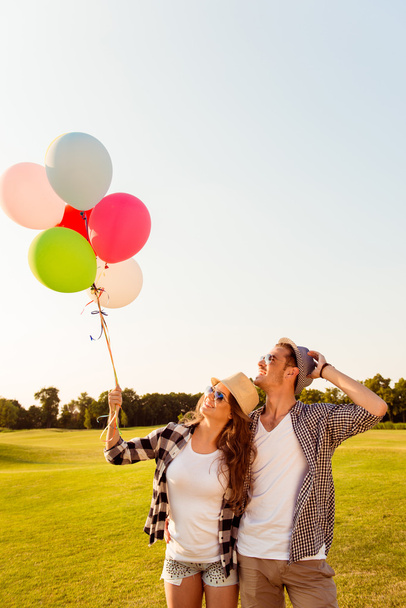 couple in love walking with balloons - Φωτογραφία, εικόνα