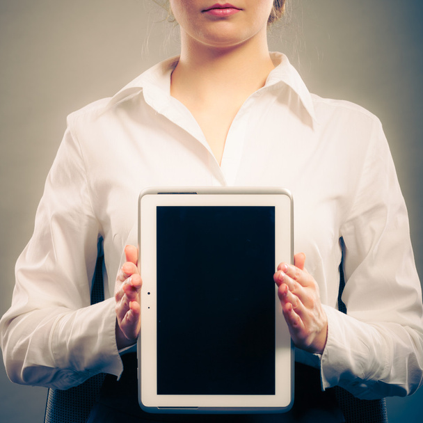 Woman with tablet. Blank screen copy space. - Фото, зображення