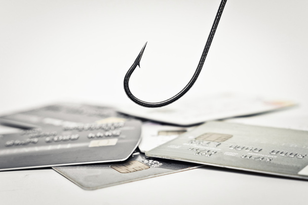 gancho de pescado sobre una pila de tarjetas de crédito
 - Foto, imagen
